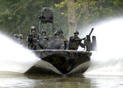 US Navy 070825-N-9769P-301 Special Warfare Combatant-craft Crewmen (SWCC) transit the Salt River in northern Kentucky during pre-deployment, live-fire training.jpg