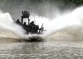 US Navy 070825-N-9769P-287 A Special Operations Craft-Riverine (SOC-R) performs a crash-back maneuver during training along the Salt River in northern Kentucky.jpg