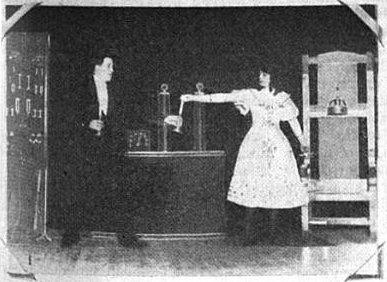 File:Electrice sideshow act 1914 - lighting candle with fingers.jpg