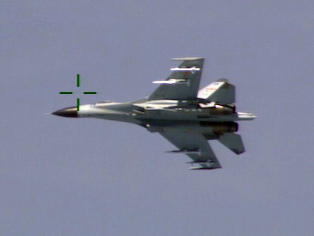 File:Chinese Shenyang J-11 from below in August 2014.JPG