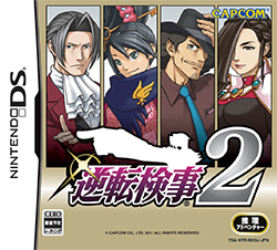 The cover shows a collage of four illustrations of characters on a beige background. The Japanese-language logo shows "Gyakuten Kenji" in purple and a silver number "2". Attached to the text is a white silhouette of Edgeworth pointing to the left.