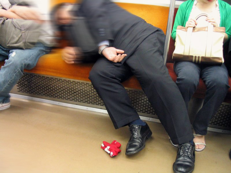 File:Salaryman asleep on the Tokyo Subway.jpg