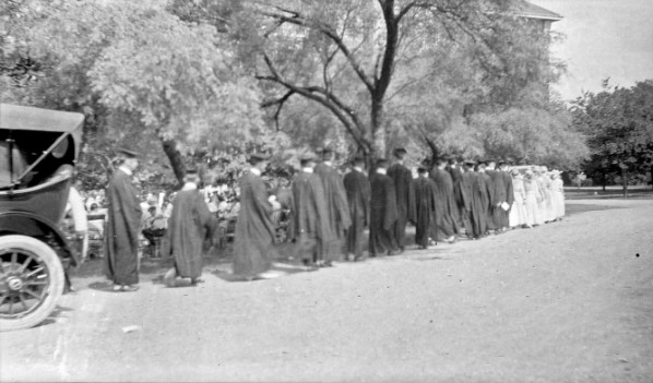 File:Line of young people at a commencement ceremony.jpg
