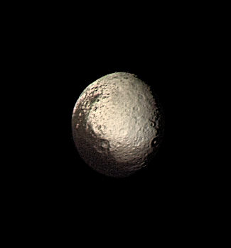 File:Iapetus by Voyager 2.jpg