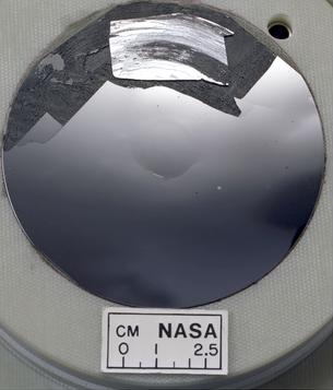 File:Silicon wafer with mirror finish.jpg