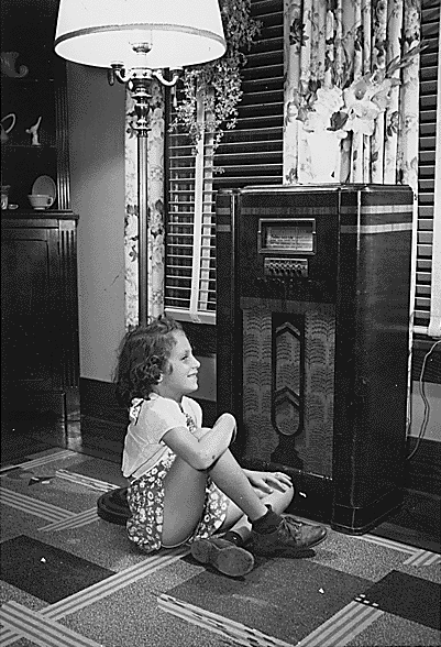 File:Girl listening to radio.gif