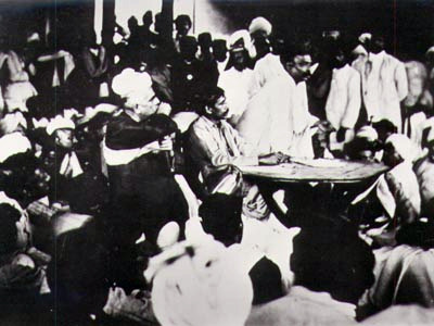 File:Sri Aurobindo presiding over a meeting of the Nationalists after the Surat Congress, with Tilak speaking, 1907.jpg
