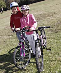 File:Jimena and Jenni have just been given bikes.jpg