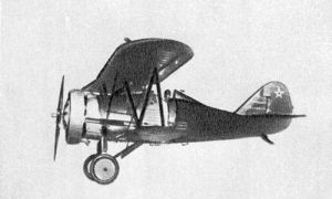 A radial-engined biplane with a metallic forward fuselage, the wings and rear fuselage covered by fabric with the ribs visible