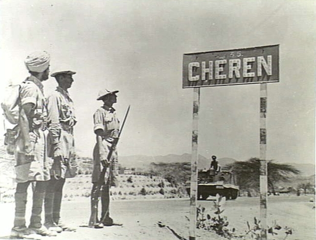 File:Indian troops stand next to a Cheren (Keren) signpost, May 1941.jpg
