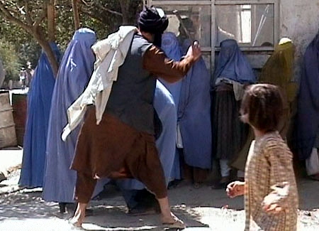 File:Taliban beating woman in public RAWA.jpg