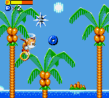 An anthropomorphic, young and brown fox flying by rotating his two tails and carrying a ring moving under a spike ball.