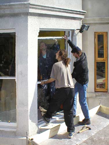 File:Volunteers installing windows at the Sumac Centre.jpg