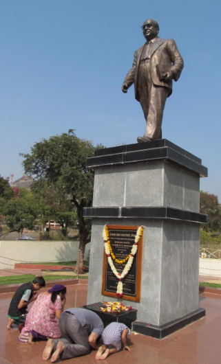 File:People paying tribute at the central statue of Bodhisattva Babasaheb Ambedkar in Dr. Babasaheb Ambedkar Marathwada University, India.png