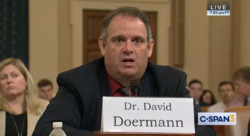 David S. Doermann testifying at a hearing of the House Intelligence Committee.png