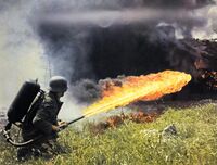 A man holding a flamethrower