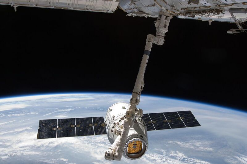 File:ISS-31 SpaceX Dragon commercial cargo craft is grappled by Canadarm2.jpg