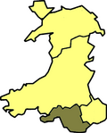 A map of Wales in yellow with an area in green (about 10%) at the top (north)