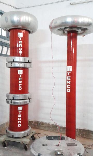 File:High voltage testing arrangement with large capacitors and test transformer.jpg