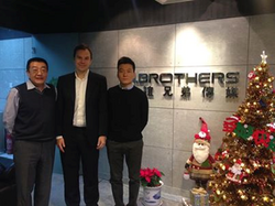 Per Lundquist (VP Sales & Acquisitions) with H brothers in China.png