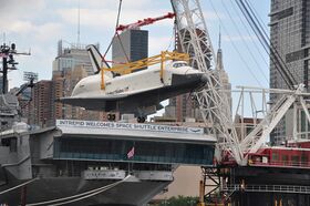 Space Shuttle Enterprise is lifted by crane (7402535806).jpg