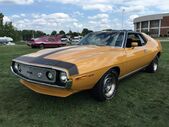 Shows a 1971 AMC Javelin AMX 401 in Mustard Yellow at 2015 AMO show