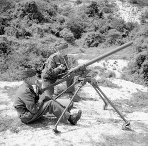 H 11843-Members of Home Guard using a Northover Projector-July 1941.jpg