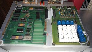 A Motorola MEK6800D2 Microcomputer, circa 1976. This microcomputer is based on a Motorola MC6800 8-bit microprocessor. The board on the left is the Microcomputer module containing the 6800 microprocessor, along with memory and I/O devices. The board on the right is the Keyboard/Display module containing a hexadecimal keypad, function keys, and 7-segment LED displays for displaying a 16-bit address and 8-bit data.