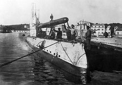 SM U-21 loads a torpedo during World War I.