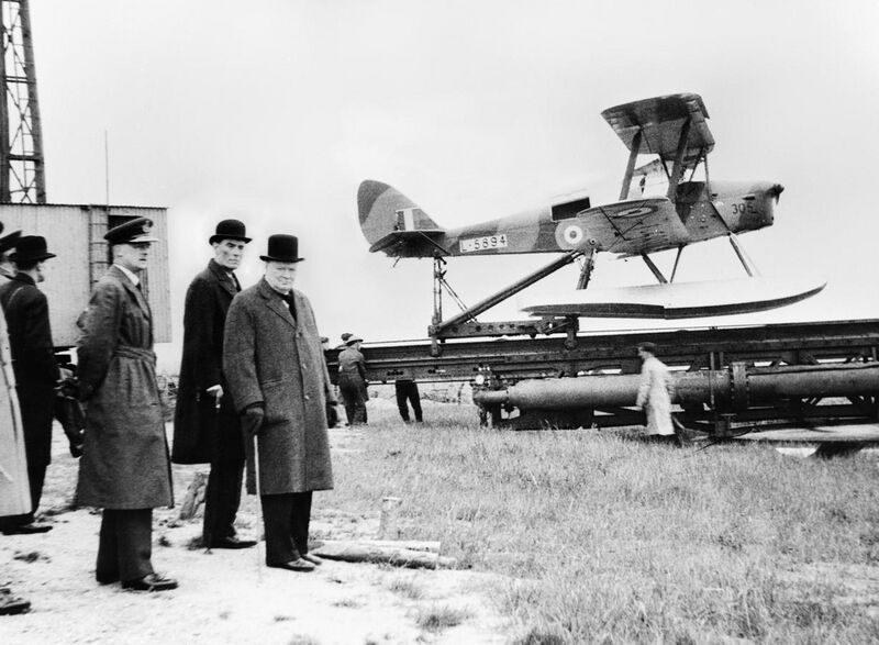 File:Winston Churchill and the Secretary of State for War waiting to see the launch of a de Havilland Queen Bee radio-controlled target drone, 6 June 1941. H10307.jpg