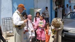 Congressional delegation meets children in Hadithah, Iraq.jpg