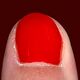 Photo of nail with red nail polish