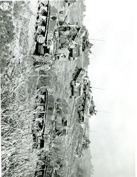 File:SC 206511 - During a respite in the hard fighting on Okinawa, these medium U.S. tanks bunch up closely on a rolling ridge, 1945.jpg