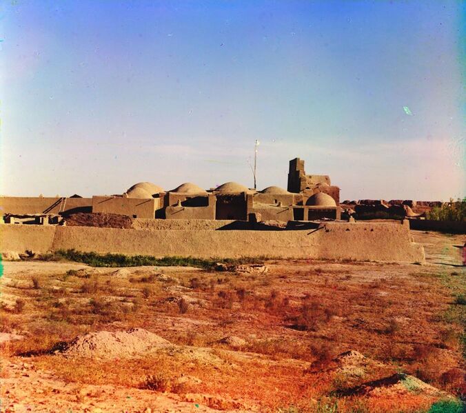 File:Domed Adobe Structures Surrounded by an Adobe Wall.jpg