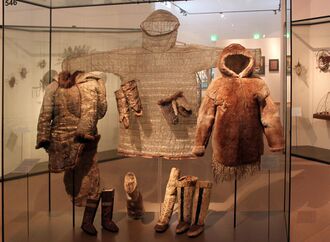 Inuit garments in a glass museum display