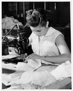 Woman sewing in a Puerto Rico garment shop.jpg