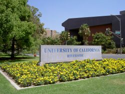 UC Riverside entrance sign with flowers