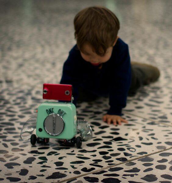 File:Child interacts with an ArtBot at 2011 show.jpg