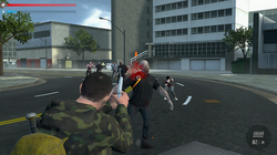 The protagonist, Brian Lee, using a pistol to shoot at a horde of zombies attack him and Eva