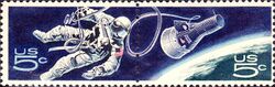 US 5 cent postage stamp design featuring White tethered to the Gemini spacecraft in Earth orbit
