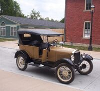 Photo of a Ford Model T on a road