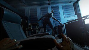 A screenshot of first-person gameplay, showing the player hiding from a character in a dimly illuminated scene.