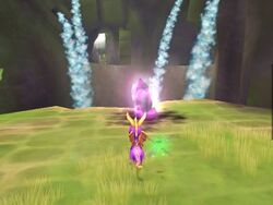 Spyro collecting a dark gem in a level of Spyro: A Hero's Tail
