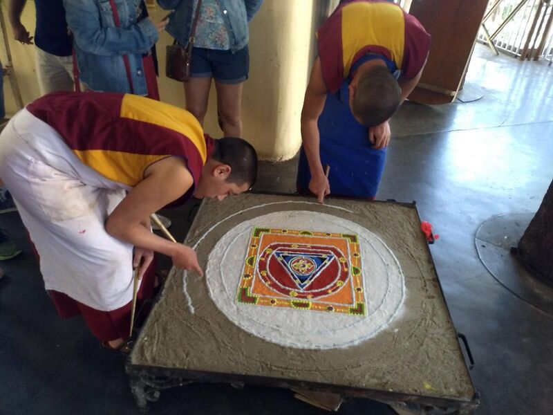 File:Buddhist Monks performing traditional Sand mandala made from coloured sand.jpg