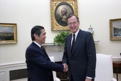 Eugene Wong with President George H.W. Bush.jpg