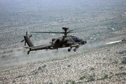 Apache AH64D Helicopter Firing a Hellfire Missile MOD 45149186.jpg