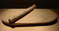 CMOC Treasures of Ancient China exhibit - millstone and roller.jpg