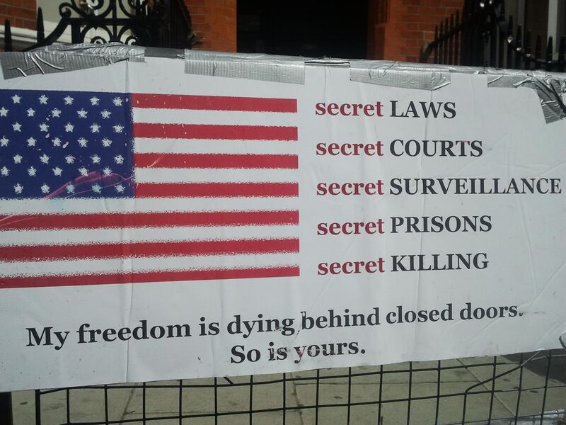 File:Secret Laws,placard in front of Ecuador embassy.jpg