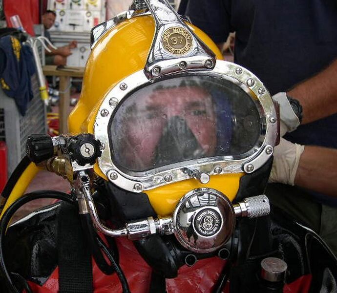 File:US Navy 051026-N-0000X-001 Electronics Technician 1st Class Matthew Ammons, a diver assigned to Mobile Diving and Salvage Unit Two (MDSU-2), is fitted with a Kirby Morgan 37 Dive Helmet.jpg