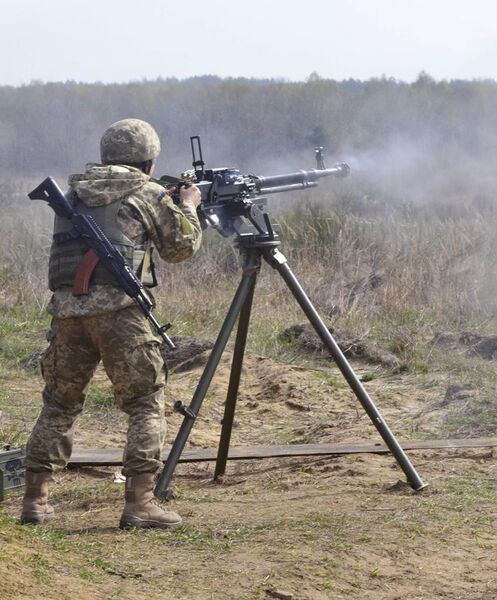 File:A soldier with the Ukrainian Land Forces fires a Degtyaryov-Shpagin Large-Caliber heavy machine gun.jpg